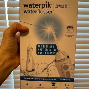 Unopened Waterpik Cordless Advanced water flosser!